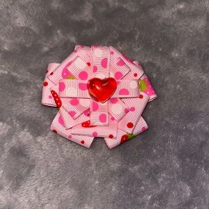 Pink strawberry hair bow.